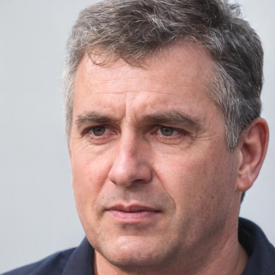 Darian Kopchek reviewing campaign strategy documents during client consultation