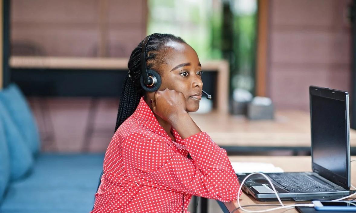 Team collaboration session reviewing campaign analytics and strategy documentation